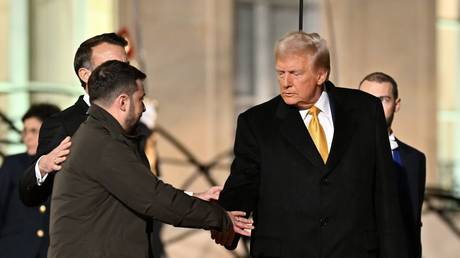 Emmanuel Macron (C), Donald Trump (R) and Vladimir Zelensky (L) leave after their meeting at the Elysee Palace in Paris, France, December 7, 2024