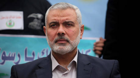 FILE PHOTO: Hamas political chief Ismail Haniyeh attends a military parade in Gaza.