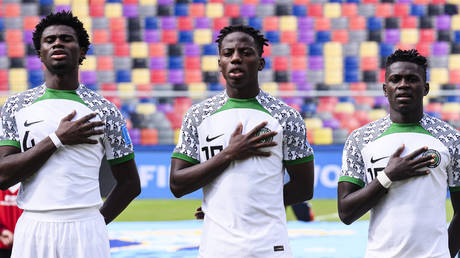 FILE PHOTO: Victor Eletu of Nigeria (C) sings the National Anthem with his teammates during FIFA U-20 World Cup Argentina 2023 Quarter Finals.