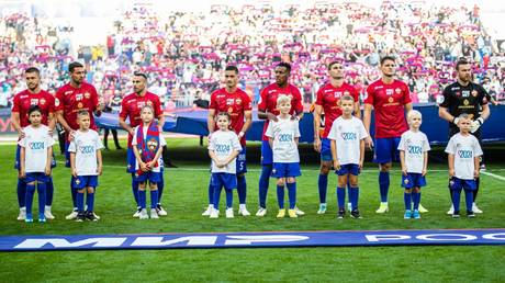 CSKA players and chilren of soldiers who have fought in Russia’s military operation in Ukraine, before a Russian Premier League match on September 14, 2024 in Moscow, Russia.