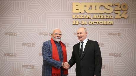 Russian President Vladimir Putin and Indian Prime Minister Narendra Modi at the BRICS Summit welcoming ceremony in Kazan on October 22, 2024.