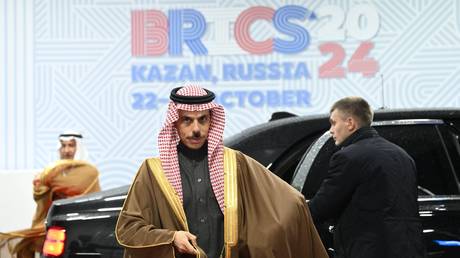 FILE PHOTO: Foreign Minister of Saudi Arabia Faisal bin Farhan Al Saud arrives for the official reception during the 16th BRICS Summit in Kazan, Russia.