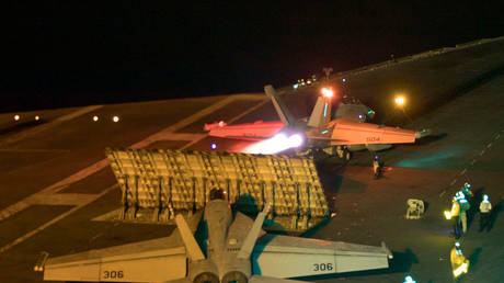 An American F/A-18E Super Hornet launches from the flight deck of the Nimitz-class aircraft carrier USS Abraham Lincoln in the Red Sea, May 10, 2019