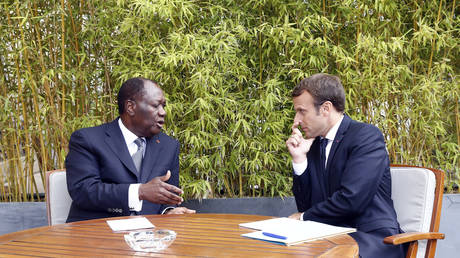 FILE PHOTO: French President Emmanuel Macron and his Ivory Coast counterpart, Alassane Ouattara, at the Elysee palace in Paris, Aug. 31, 2017.