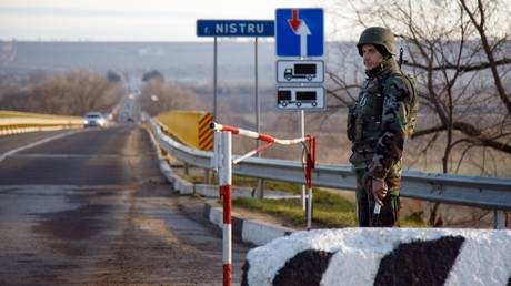 A peacekeeper from the Moldovan Armed Forces is seen at the checkpoint in Tiraspol, Transnistria.