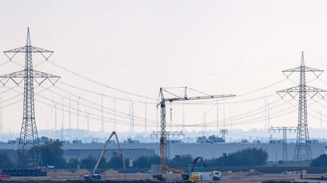 Construction machinery stands at the site of a canceled Intel chip factory in Magdeburg, Germany, September 19, 2024