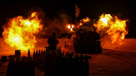 FILE PHOTO: An Israel Defense Forces (IDF) artillery unit, using a self-propelled artillery howitzer, fires towards Gaza near the border in Southern Israel.