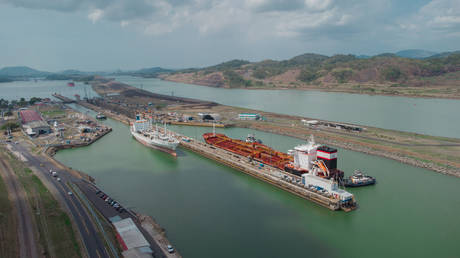 FILE PHOTO: Boat passing Pedro Miguel locks in Panama, famous channel shortcut in central America.