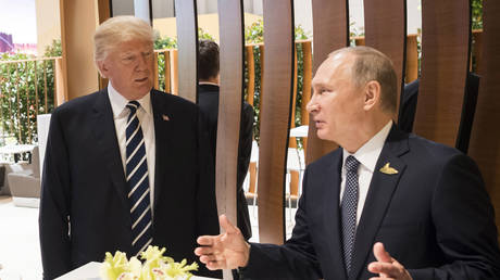 FILE PHOTO. Donald Trump and Russian President Vladimir Putin meet during the G20 Summit on July 7, 2017