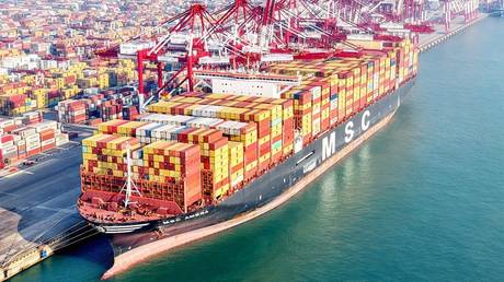 Cargo ships load and unload foreign trade containers at Qianwan Port in Shandong province, China, on January 13, 2025.