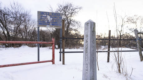 FILE PHOTO: A border marker at an unmanned crossing into Vermont from Saint-Armand, Quebec, Jan. 15, 2025