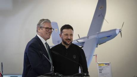 UK PM Keir Starmer and Ukraine's Vladimir Zelensky pose in front one of the drones built in Ukraine with funding from London, January 16, 2025