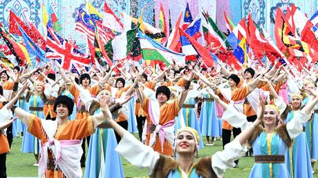 FILE PHOTO: Artists dressed in national costumes perform during the closing ceremony of the 2024 BRICS Sports Games in the village of Mirny, outside Kazan, Republic of Tatarstan, Russia.