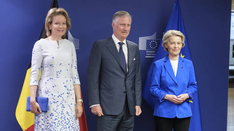 FILE PHOTO: Queen Mathilde d'Udekem d'Acoz (L), and King Philippe of Belgium (C) are welcome by the President of the European Commission Ursula von der Leyen (R) prior a visit of the EU Commission college meeting in the Berlaymont, the EU Commission headquarter in Brussels, Belgium.