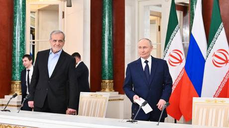 Russian President Vladimir Putin and Iranian President Masoud Pezeshkian at the Kremlin in Moscow, Russia, January 17, 2025.