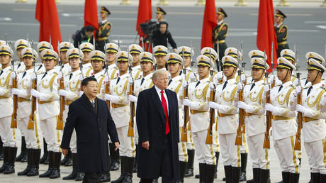 FILE PHOTO: China's President Xi Jinping and US President Donald Trump.