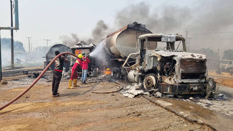 Firefighters extinguish fire from a tanker that exploded in Suleja, Nigeria