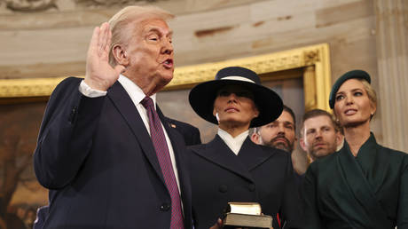 President-elect Donald Trump takes the oath of office as he is sworn in as president during the 60th Presidential Inauguration in the Rotunda of the U.S. Capitol in Washington, Monday, Jan. 20, 2025.