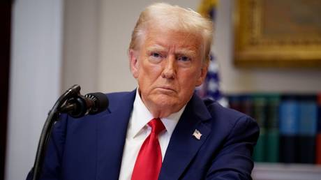 US President Donald Trump takes a question from a reporter during a news conference at the White House.